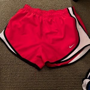 Nike red running shorts